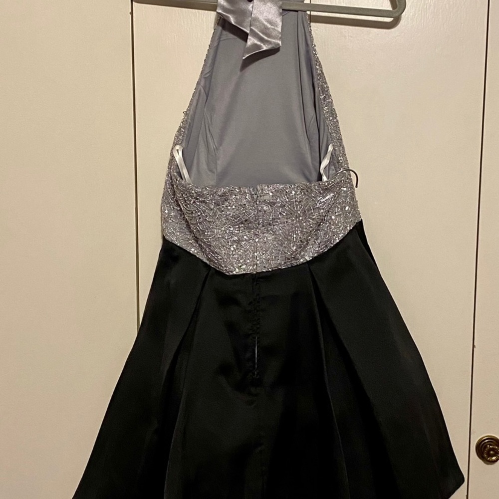 Strapless short, knee high, black with metallic silver.